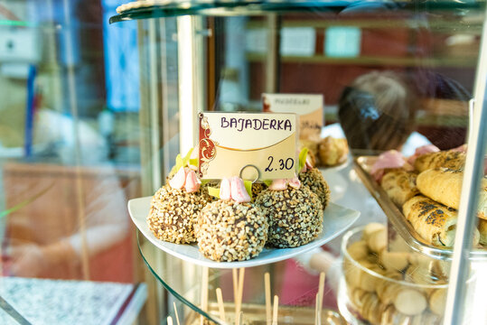traditional polish pastry called "Bajaderka" close up in bakery shop behind window