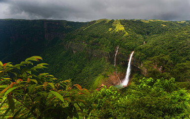 Khasi hills with waterfalls flanked by forested slopes near Shillong, India.