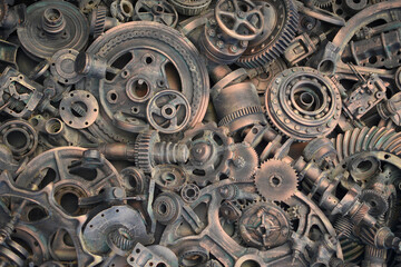 steampunk scrap metal for recycling background. a lot of different rusty industrial part detail for melt and reused