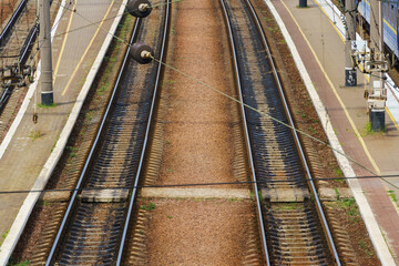 Fototapeta na wymiar railway station infrastructure - rails and platform without people
