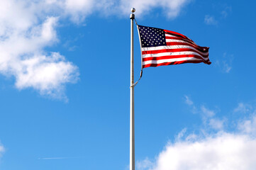 american flag on the blue sky background