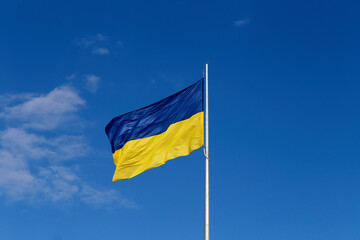 National flag of independent Ukraine waving in the wind