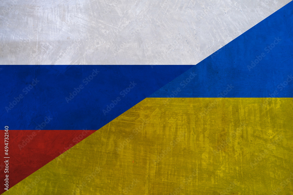 Wall mural Flag of Russia and Ukraine on a grunge concrete wall. War between Ukraine and Russia background