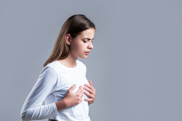 Woman suffering from chest pain. Woman having heart attack. Heart attack concept. Girl feeling...