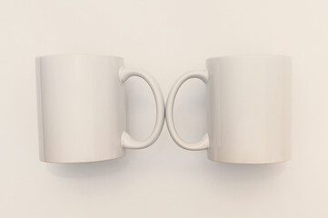 Mockup of two white ceramic mugs on a white background. Concept of breakfast in the morning.