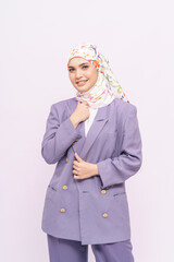 Portrait of hijab girl smiling. Pretty muslim girl. Beautiful asian muslim woman model in formal office attire posing over white background studio