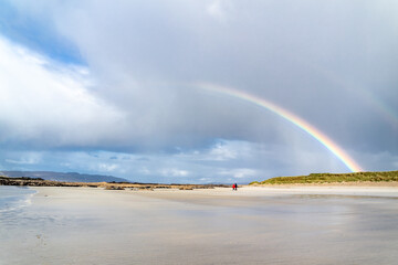 Amazing rainbow above Carrickfad by Portnoo at Narin Strand in County Donegal Ireland