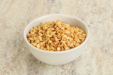 Crunched roasted peanut in the bowl