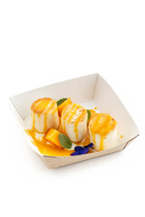 cheesecakes with fruit and sauce