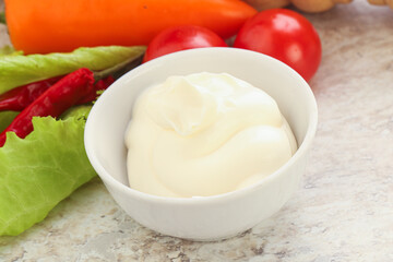 Organic mayonnaise sauce in the bowl