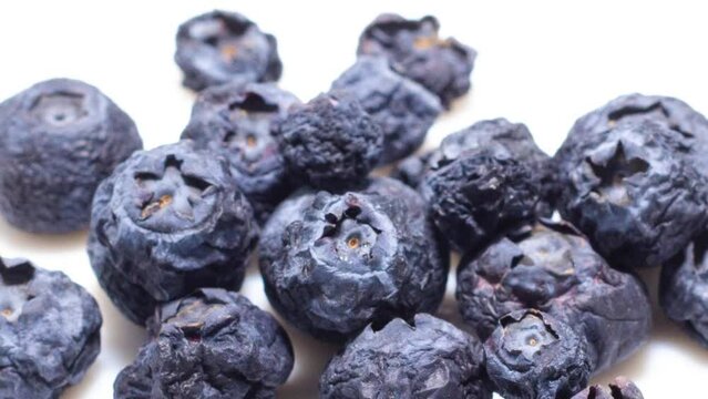 Blueberrys becomes dry and wrinkled. Berrys dehydrates quickly. Fast timelapse. Concept of aging, time, health, skincare, cosmetic care.