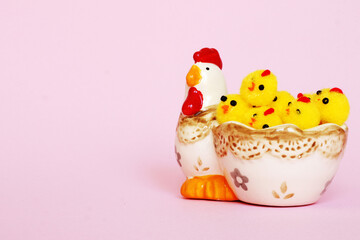 Easter composition on a light pink background with a space for your text or design