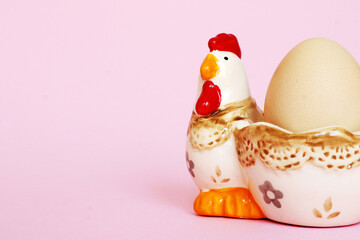 Easter composition on a light pink background with a space for your text or design