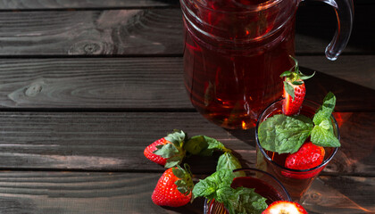 fresh strawberry lemonade on a dark wooden background