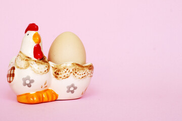 Easter composition on a light pink background with a space for your text or design