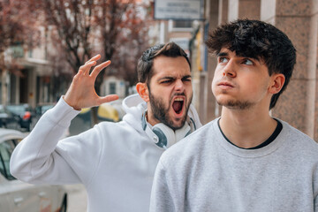 young people arguing in the street - obrazy, fototapety, plakaty