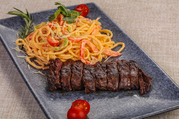 Grilled beef steak served pepper