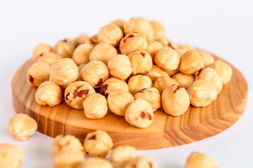 peeled hazelnuts on a stand
