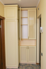 white brand new furniture - wardrobe with closeup photo