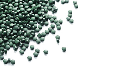 Green tablets made of natural organic spirulina