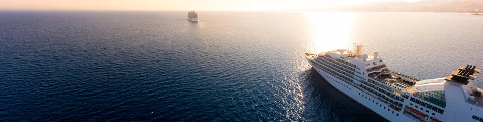 Gordijnen Sunset over the sea with a cruise ship in Mediterranean sea. Akrotiri bay, Limassol, Cyprus © kirill_makarov