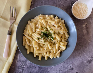 Cheese macaroni pasta with parmesan. Vegetarian dish.