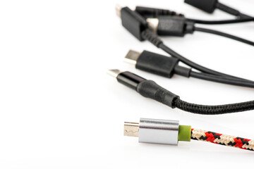Black USB cable on white background. USB and USB-mini cable connectors close-up. 