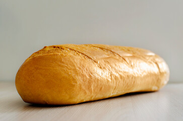 a loaf of wheat flour lies on the table.