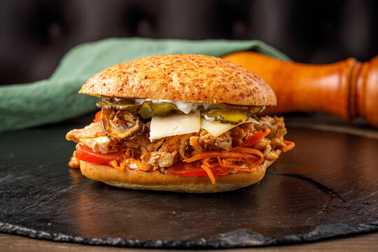 Burger And Fajita Sandwich. FAJITAS With Colored Pepper And Onions, Served With Tortillas, Salsa And Sour Cream.