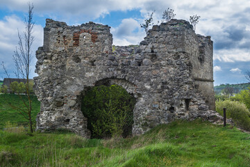 Fototapeta na wymiar Ruins of an old castle, XV century. Sutkivtsi village, Khmelnytsky region, Ukraine.