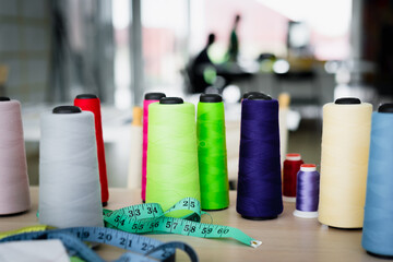 Colorful thread with blur Women fashion designer background in home. Start up. Business ideas...