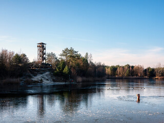 Alone man swimming in cold water.