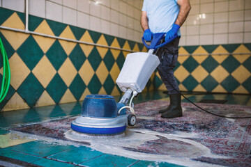 Carpet chemical cleaning with professionally disk machine.