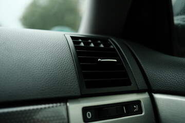 Air conditioning in the car. Control panel and ventilation. High quality photo