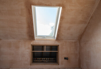 Loft renovation conversion project, brown plastered walls