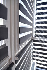 Obraz premium sunlight breaks through the blinds
