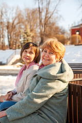 Fototapeta premium Middle-aged women on walk in spring park