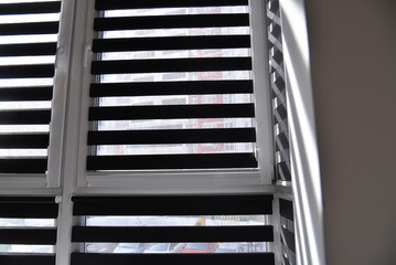 sunlight breaks through the blinds