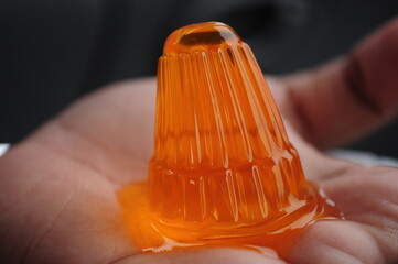 Orange Jelly on a Hand