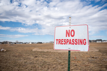 no trespassing sign by street
