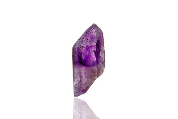 macro mineral stone amethyst on a white background