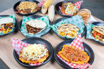 Mix of Colombian corn arepas, traditional flavors with meat, vegetables and cheese