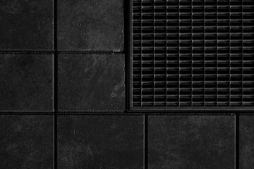 Naklejka premium Old black concrete wall. Grunge tetxured background