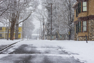 Empty street with snow on historic Hugenot street in New Paltz, NY