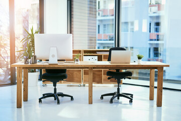 Everything for the modern businessperson. Shot of an empty office space workspace.