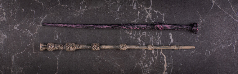magic wands on a black background