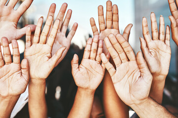 We have questions. Cropped shot of a group of unrecognizable peoples hands.