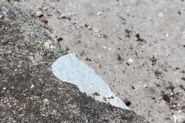 White pain splatter on the cement 