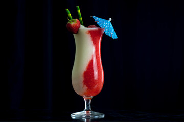 A Miami Vice Cocktail made from a Pina Colada and a Strawberry daiquiri