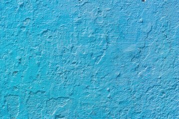 Fototapeta na wymiar Photo of an old weathered concrete wall tinted blue to use as a background